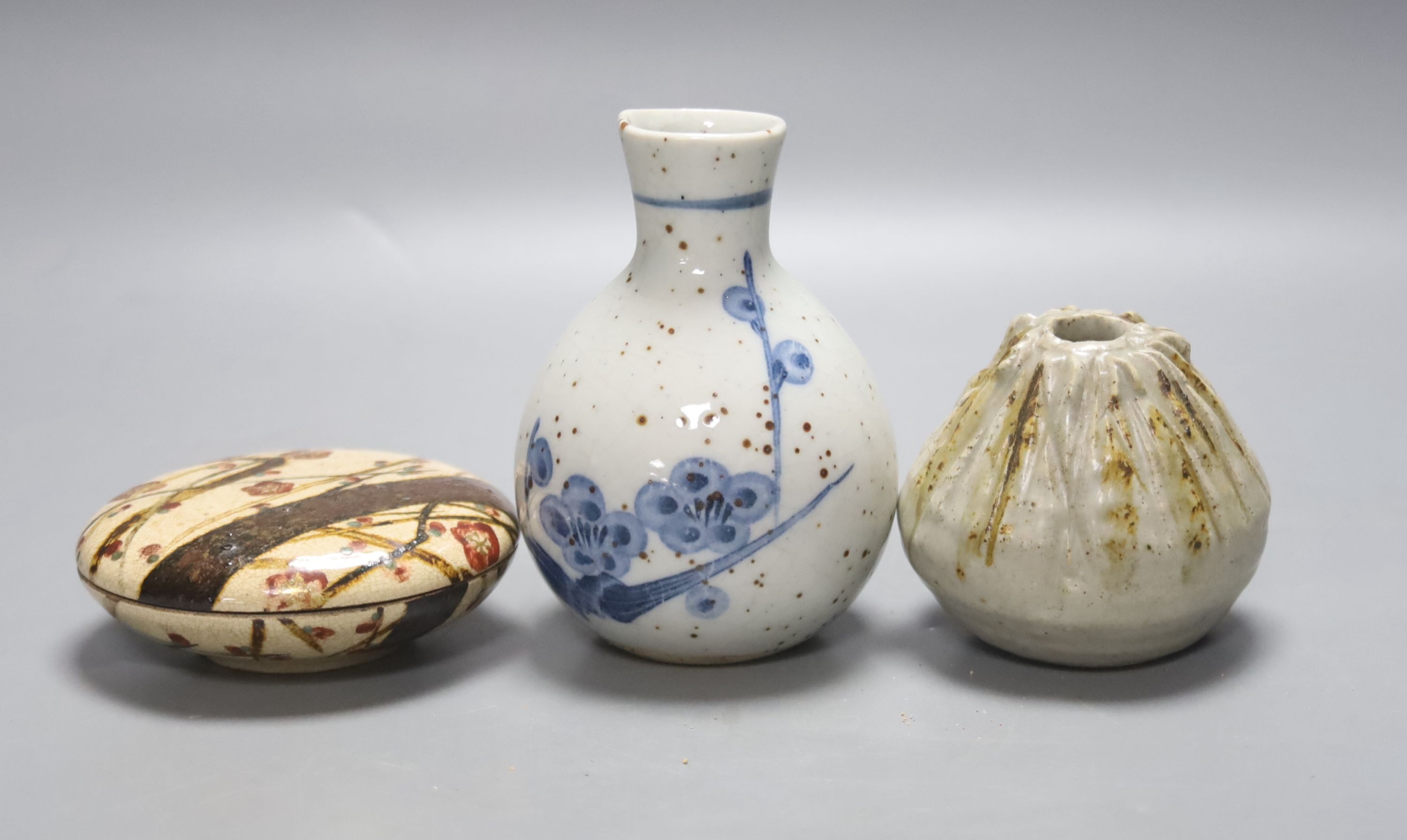Two Japanese ceramic water droppers and a stoneware box and cover, in the style of Ogata Kenzan, old collection label, tallest 11cm